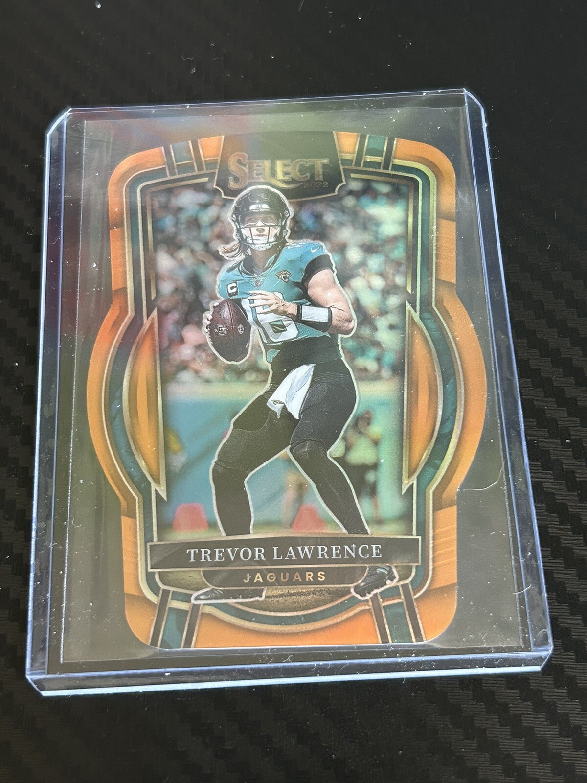 2022 Select NFL Trevor Lawrence Club Level Orange Prizm Die Cut /199
