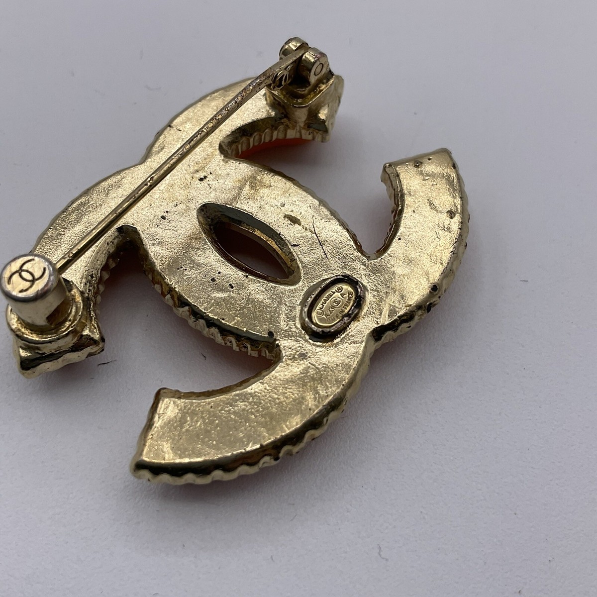 Vintage Large Gold And Orange CHANEL Classic CC Logo Brooch