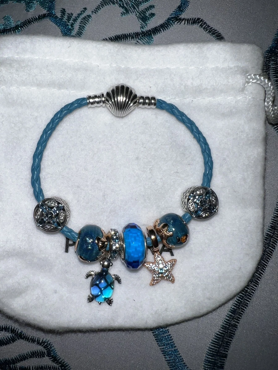 Charm bracelet, beads of imitated turquoise & silver