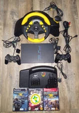 Vintage PS2 Console W/ 2  Controllers, MC 2 Steering Wheel & Pedals, & 2 Games