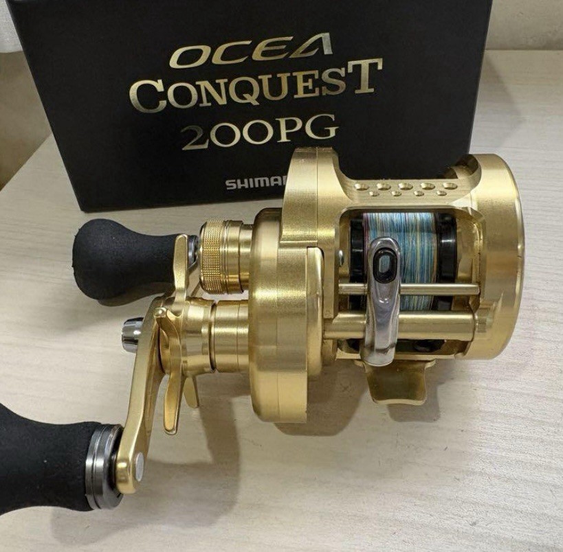 リール SHIMANO - OCEA CONQUEST 200PG shimano : OCEA CONQUEST 200PG, Right hand, Off-Shore Round