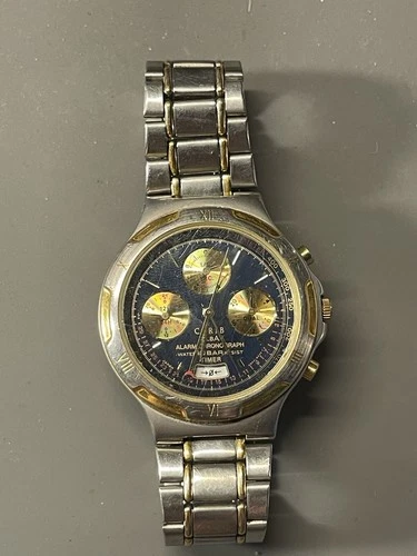 Working Vintage Seiko Alba Carib N944-6A40 men's watch 2-tone with blue dial