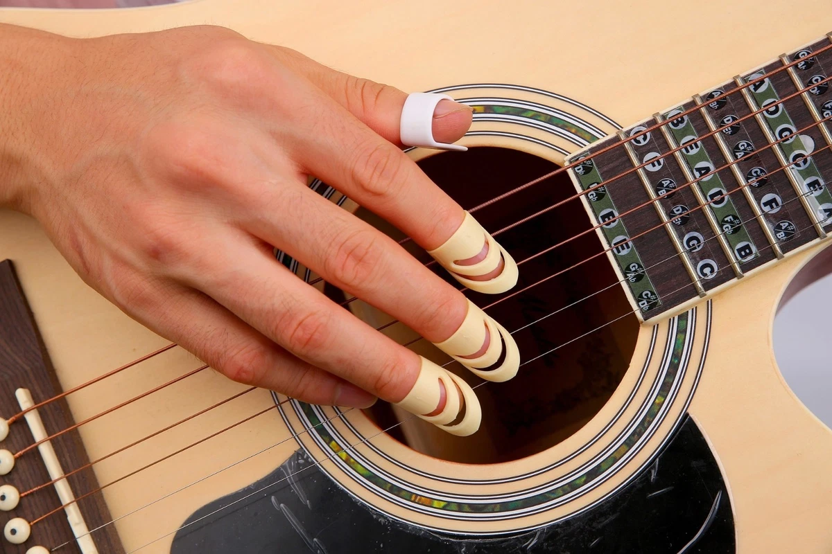 Fingernail Lesson for Classical Guitar with Photos, Diagrams, and Nail  Shape Advice. How to file and shape your nails for classical guitar.