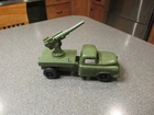 VINTAGE ROSBRO PLASTICS ARMY FLATBED TRUCK W/CANNON & SHELL TESTED & WORKS