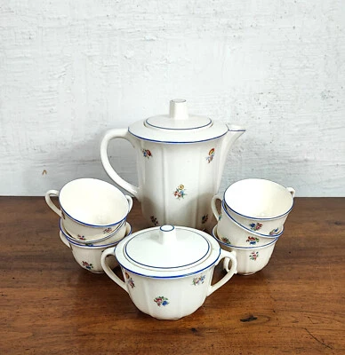 joli service à thé ou café en céramique avec tasse théière et pot à sucre blanc - Photo 1/4