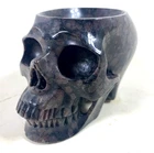 5" 2.6 lb Garnet and/or arfvedsonite stone carved skull