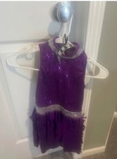 Dance Costume. Used once. Size 6x-7. Dress was stored after use, purple.