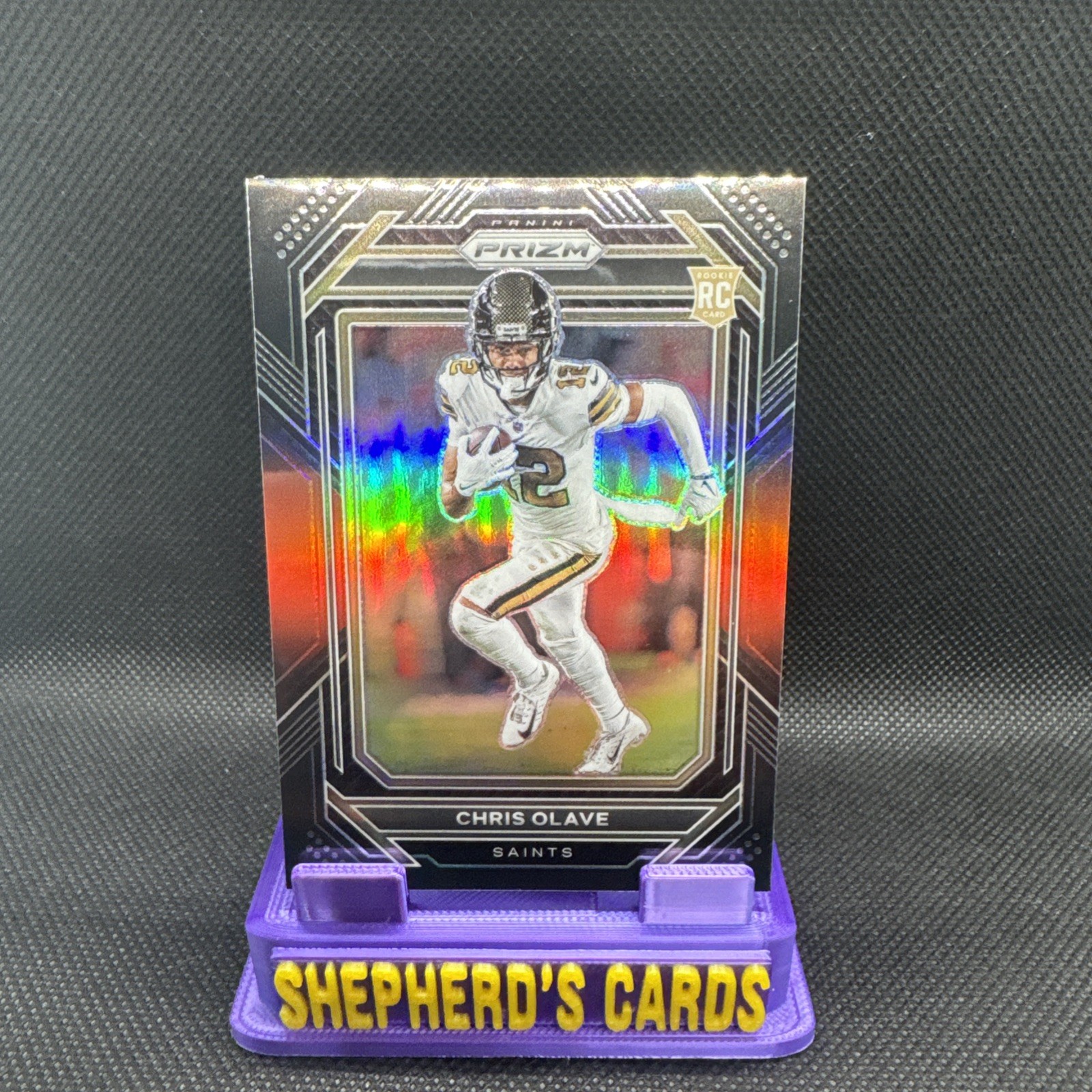 Chris Olave 2022 Panini Chronicles Prizm Black Red Prizm Rookie /99 #PB-14