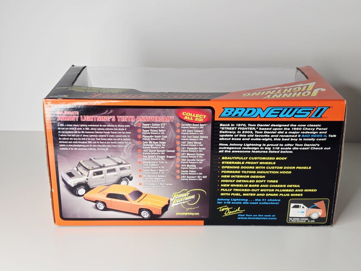 Johnny Lightning Bad News II 1/18スケール Johnny Lightning - Bad News II Orange - Tom Daniel - 1:18 Diecast