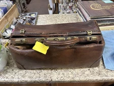 Antique leather Doctor's bag with brass latches and lock.  No key.