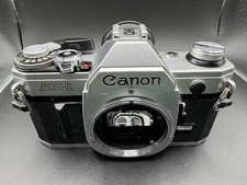Canon AE-1 35mm Film Camera For Parts Or Repair. Mirror Releases When Winding.