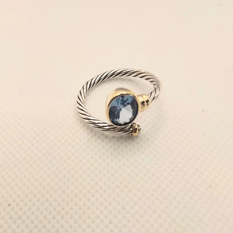 anello donna oro e acciaio con topazio azzurro - Immagine 2 di 3