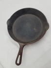 Griswold Cast Iron Skillet No. 8 sits flat cookware- camping
