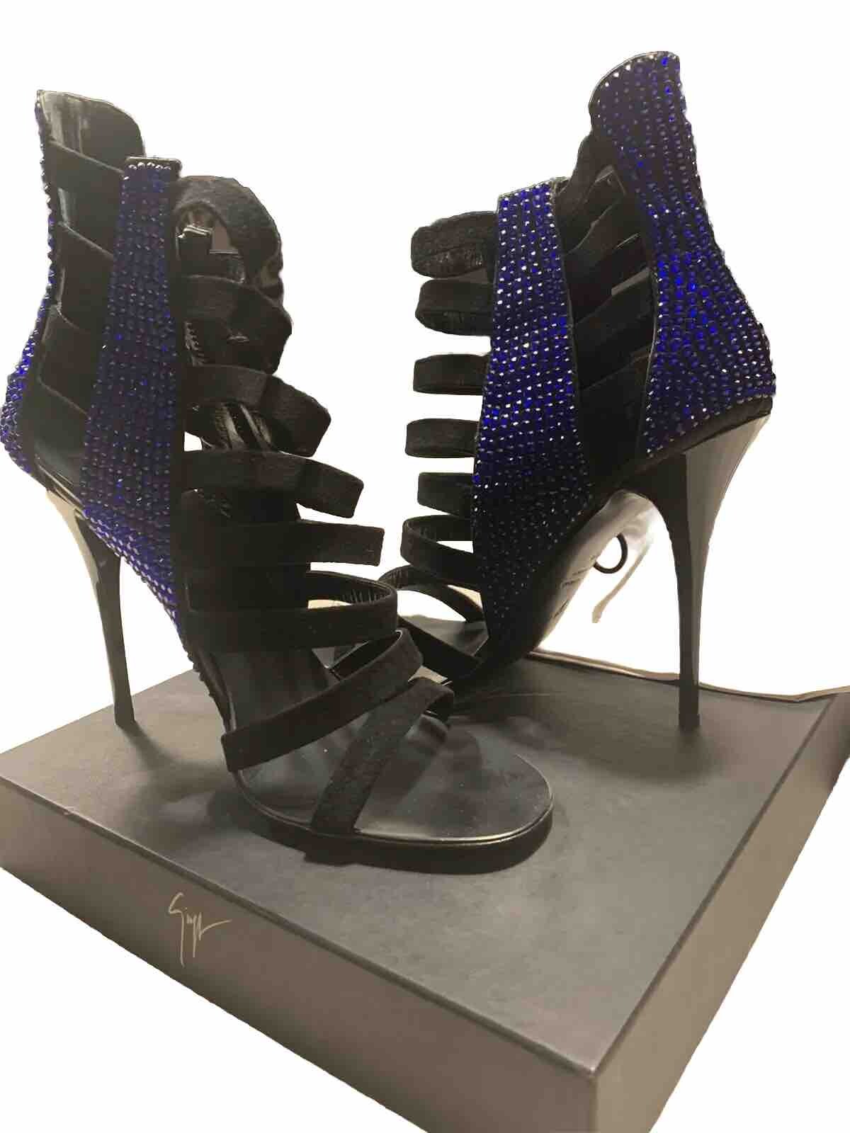 - Brand New In Original Box. Size 39.
