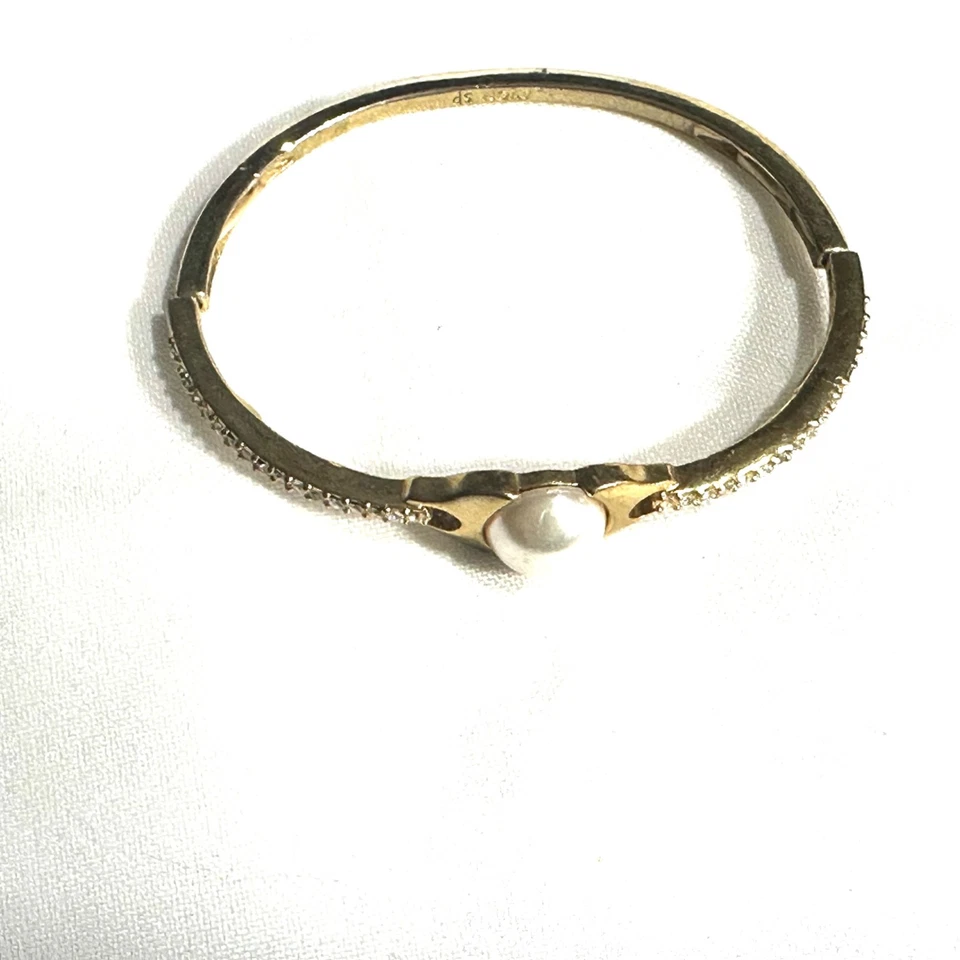 Brazalete elástico de perlas sintéticas Avon Pearlessence tono dorado 2007 Foto 3 de 4