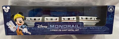 DISNEY PARKS AUTHENTIC “MONORAIL GOLD” 4 PIECE DIE CAST METAL TOY