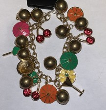 Tanya Creations Bracciale Charm Martini Ombrello Ciliegie Tono Oro Oliva Perline7”