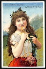 Niagara Gloss Starch Victorian Trade Card Smiling Gril Chews on Vines?