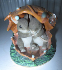Charming Tails. Mice sheltering from the rain. We'll weather the storm together
