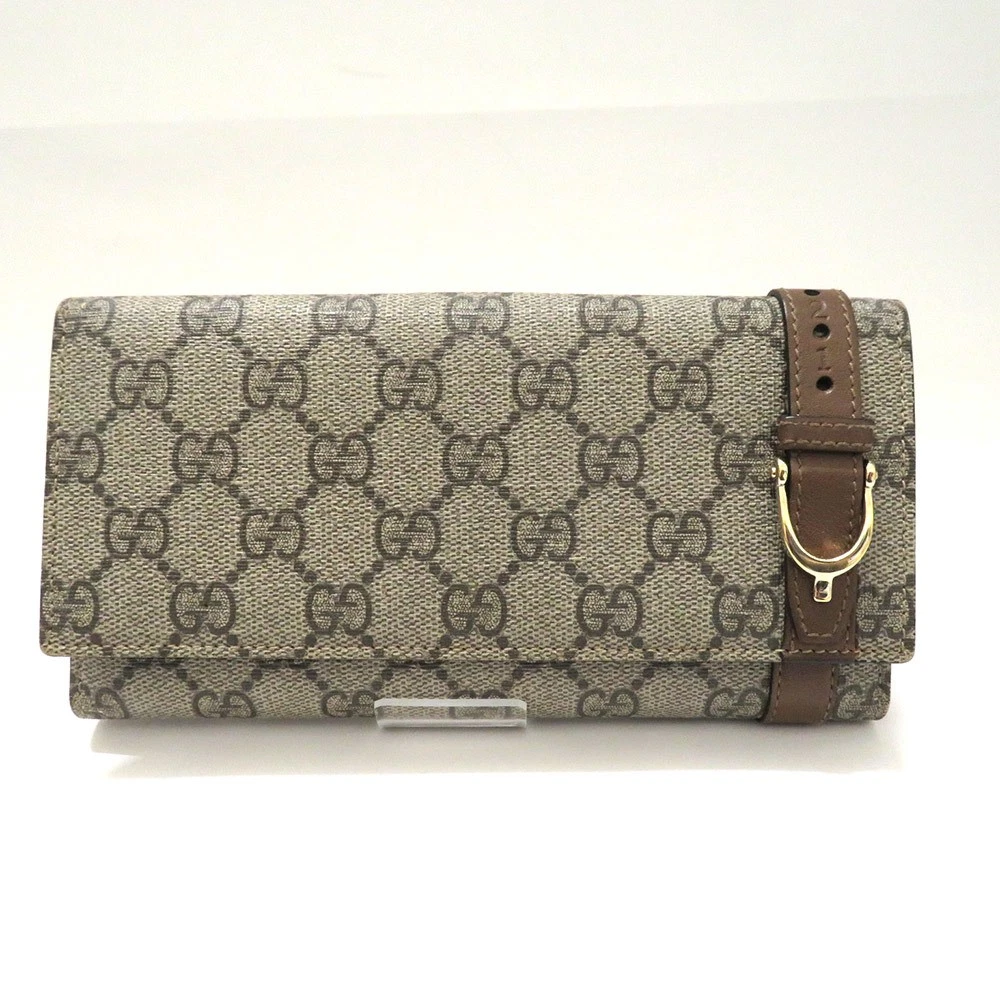 Portefeuille long Gucci GG Supreme bi pli 309754 PVC cuir A rang gris marron d'occasion
