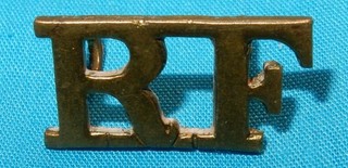 FINE EARLY RF THE ROYAL FUSILIERS SHOULDER TITLE BADGE GENUINE LOOP LUGS