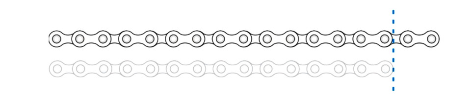 New chain laid next to the old chain, cut at the same length