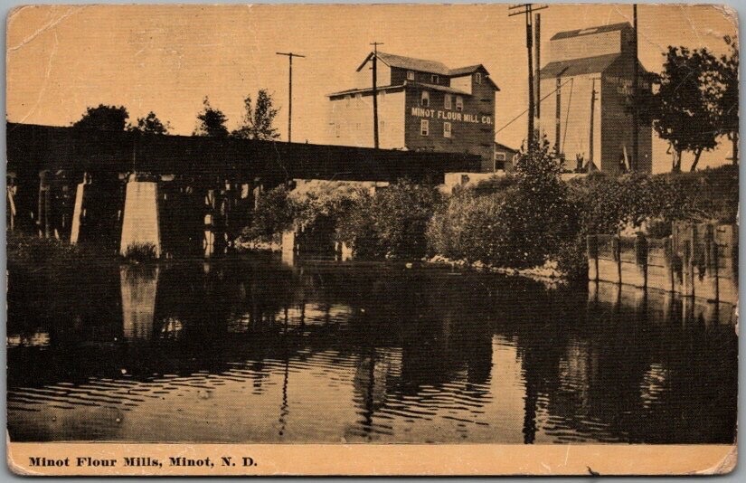 1913 MINOT, North Dakota Postcard "Minot Flour Mills" River / Bridge