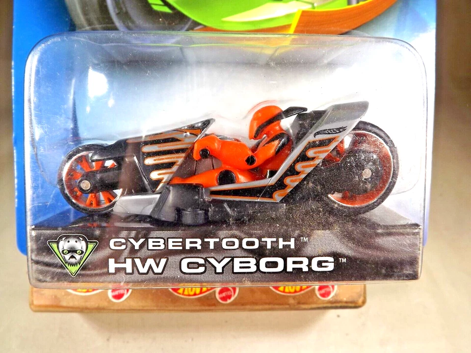 Hot Wheels Thunder Cycles Cybertooth HW 2003 Cyborg gris-negro con ruedas naranjas Foto 2 de 4