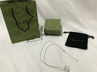 Gucci Halskette mit GG Anhänger ineinandergreifend silberfarben und Ring