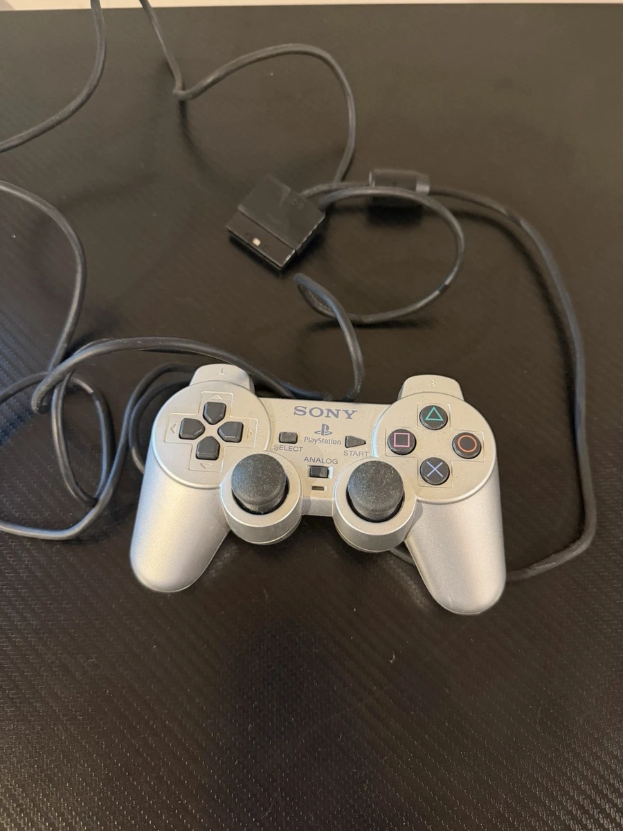 Manette ps2 grise d'occasion - Consoles Manette ps2 grise d'occasion - Consoles