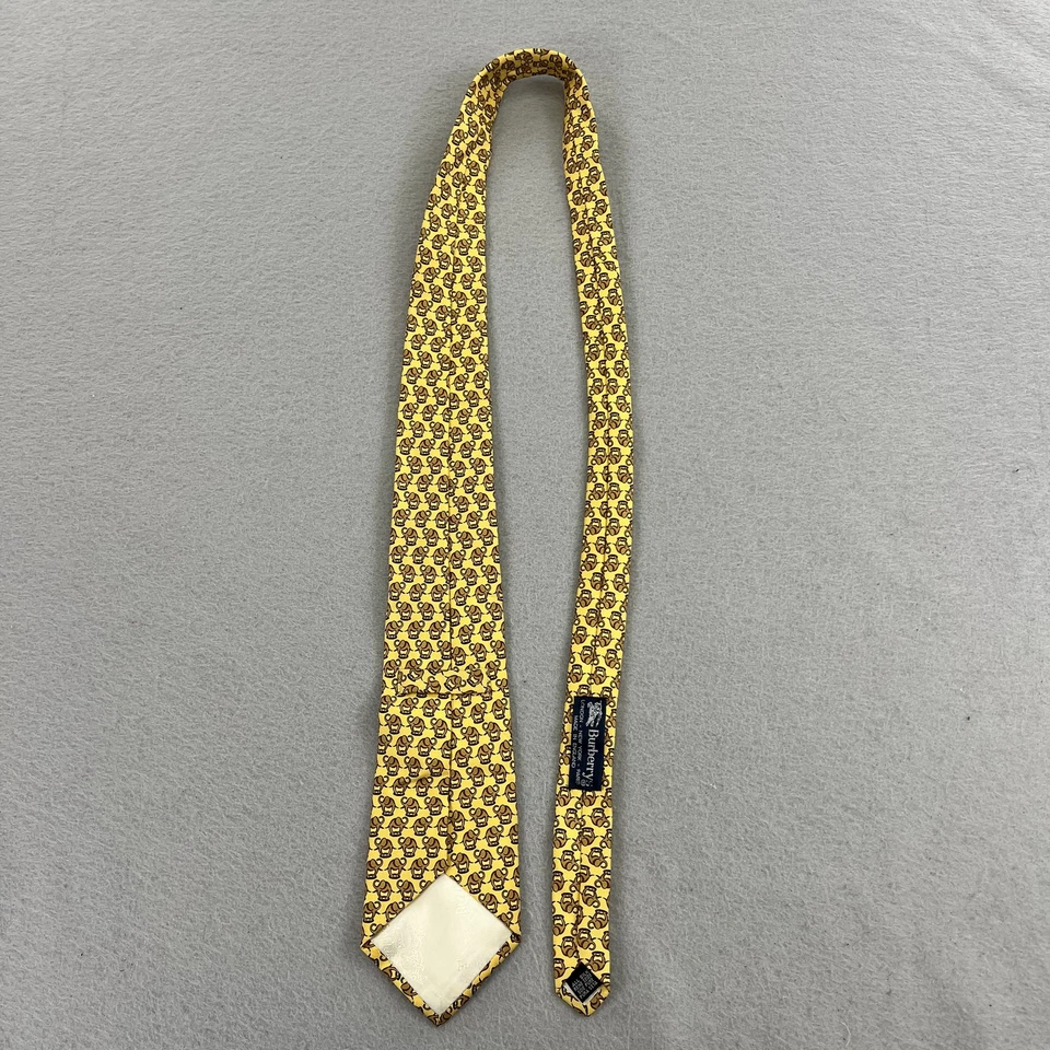 Corbata de seda Burberrys para hombre amarilla marrón con estampado de elefante hecha en Inglaterra Foto 4 de 4