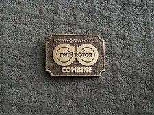 THE GREAT AMERICAN BUCKLE CO SPERRY NEW HOLLAND COMBINE BELT BUCKLE ( USA MADE )