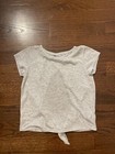 Girl’s Zella Light Gray Short Sleeve Shirt Size 14-16 Opening Tie In Back — photo 1