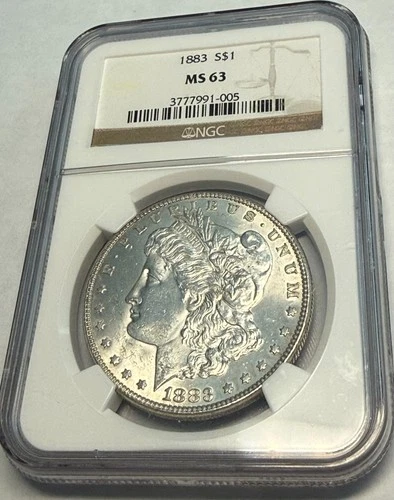 1883 satiny white choice BU Morgan silver dollar. NGC MS63. #kk005