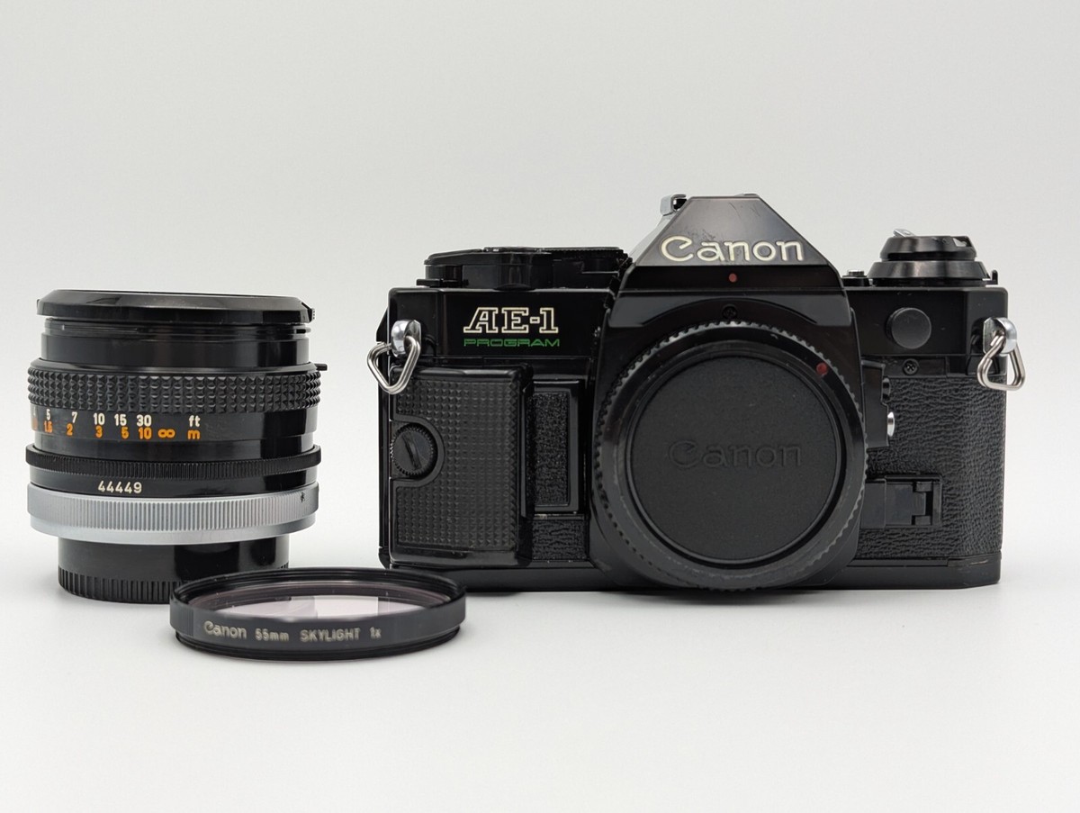 キャノン Canon AE-1 + FL 50mm F1.8 Canon AE-1 Camera with Canon 50mm f1.8 Lens | Blue Moon Camera