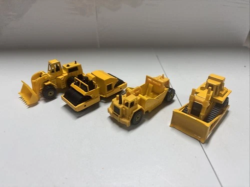 Vintage lot of four hot wheels construction vehicles
