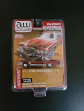 AUTO WORLD 1:64 1976 BURGUNDY CADILLAC COUPE DEVILLE CUSTOM LOWRIDERS CP7661