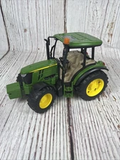 Bruder John Deere 2347-01 Tractor 2014. 5115M John Deere Tractor