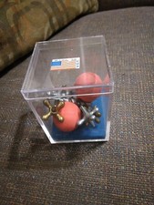 TWO balls and Ten Metal Jacks