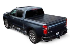 Leer Hard Quad-Fold Tonneau Cover | For 09-19 Ram 1500 09-23 2500 3500  6'4" Bed
