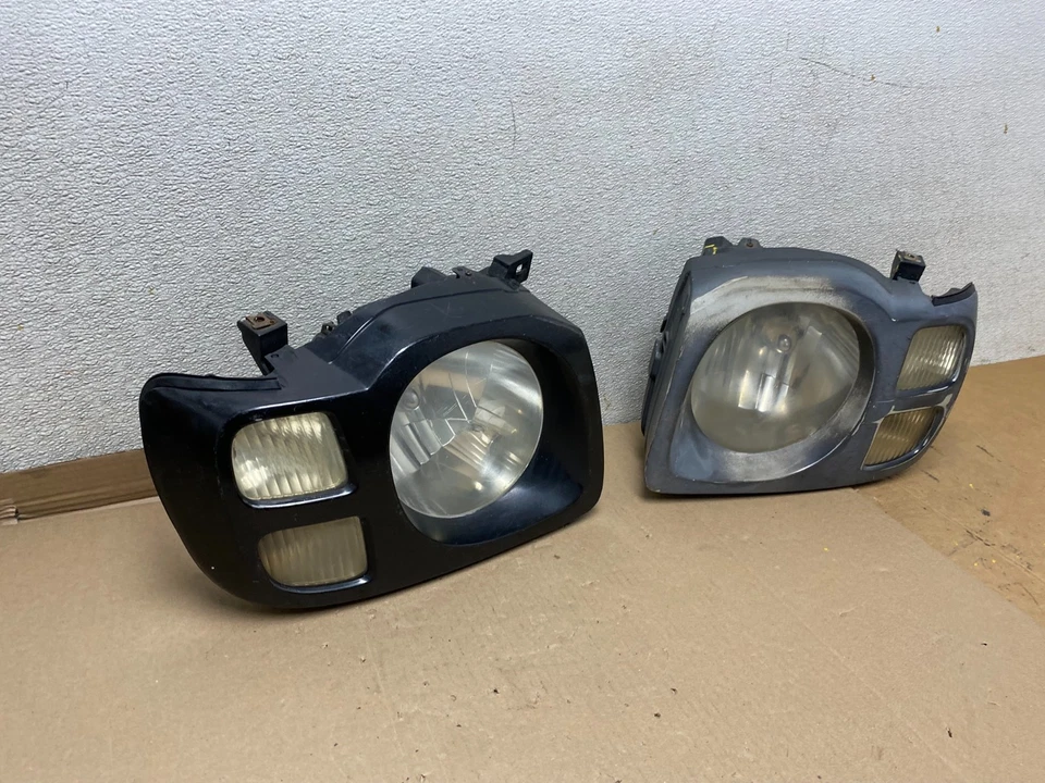Faros laterales izquierdo+derecho Nissan Xterra 2002 2003 2004 OEM U0927 DW Foto 3 de 4