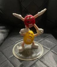 M&M Character Figurine 6" Balancing Yellow Peanut Lifting Red Chocolate Plastic