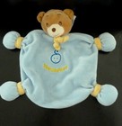 *. DOUDOU PLAT NOUNOURS OURS BLEU NOEUD BRODERIE JAUNE TETE BEBE EXCELLENT ETAT