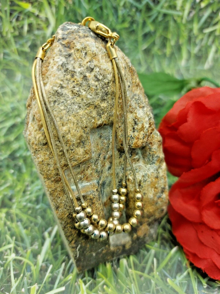 Pulseira Napier assinada tom dourado e prata bolas estacionárias correntes triplas 7" - Imagem 2 de 4