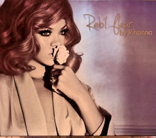 Reb'l Fleur by Rihanna 4 Piece Gift Set 3.4 oz EDP  2 x 3oz Lotion  Gel  Mini