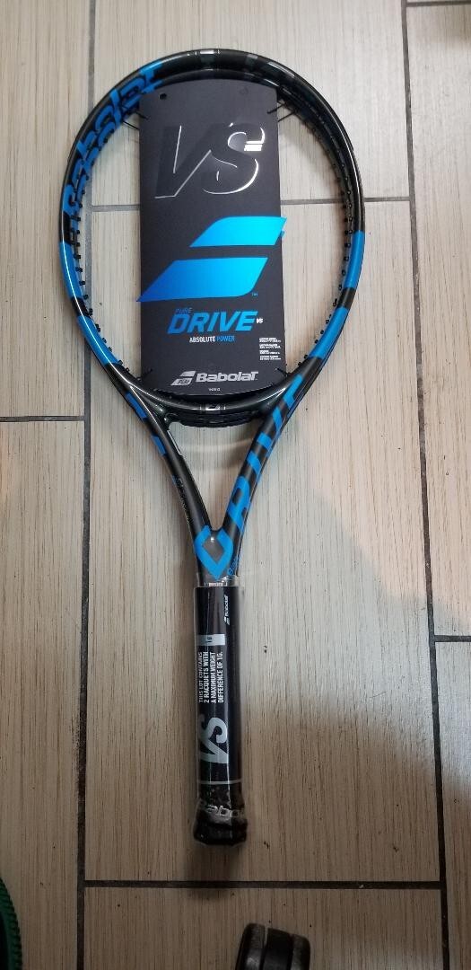 A Pair of Babolat Pure Drive VS 4 1/4  Tennis Racquet