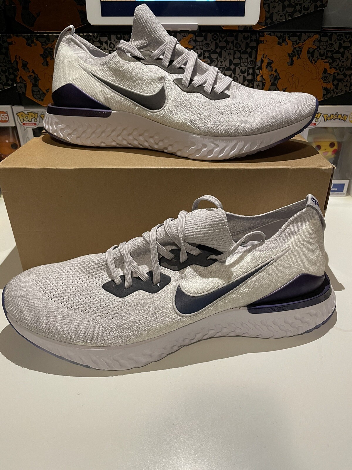 grey nike epic react