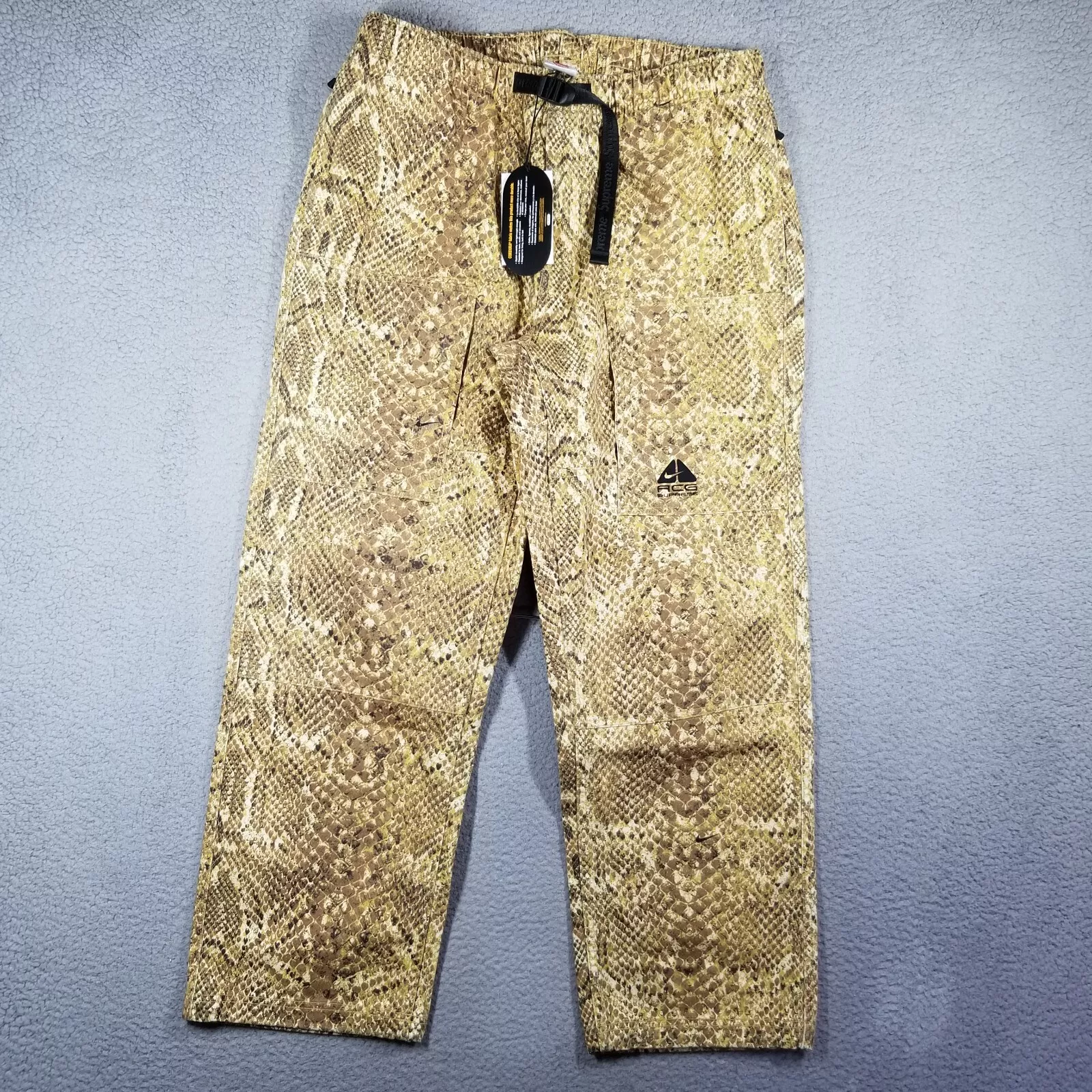 Supreme X Nike ACG pantalon en denim ceinturé hommes grand jean doré peau de serpent DN3251 777