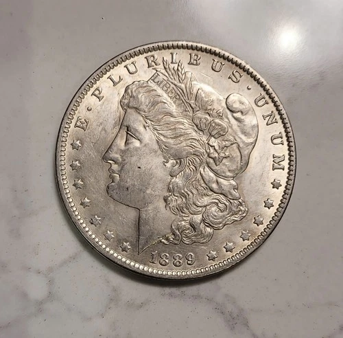 1889 O Morgan Silver Dollar Strong AU Better Grade