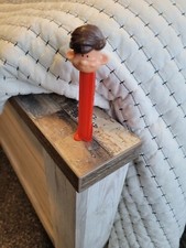 Vintage Pez Pal Boy Burnette Hair PEZ Dispenser WITH FEET Red stem made Yucoslav